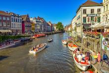 Ghent cannal with boats and house fronts