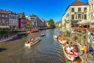 Ghent cannal with boats and house fronts